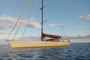 Custom Maxi One Design Grand Mistral Sailing yacht Maxi One Design Grand Mistral 80, 1996, on calm sea at sunset.