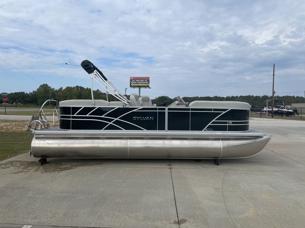 Sylvan 822 LZ Mirage 2025 Sylvan 822 LZ Mirage pontoon boat on display outdoors.
