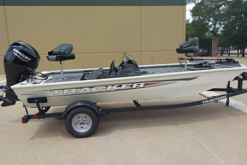 Tracker Pro 170 2026 Tracker Pro 170 boat on trailer, featuring Mercury outboard motor.