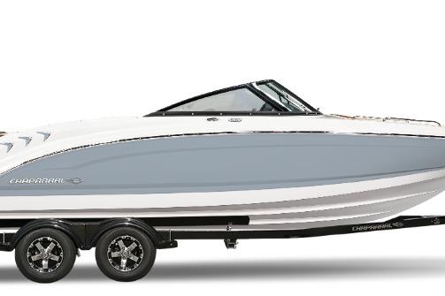 Chaparral 21 SSi 2026 Chaparral 21 SSi boat, sleek design, dual-axle trailer, side view.