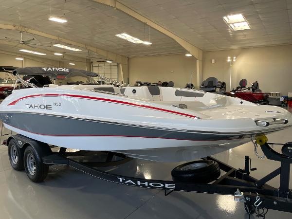 Tahoe 1950 2023 Tahoe 1950 boat on trailer in showroom.