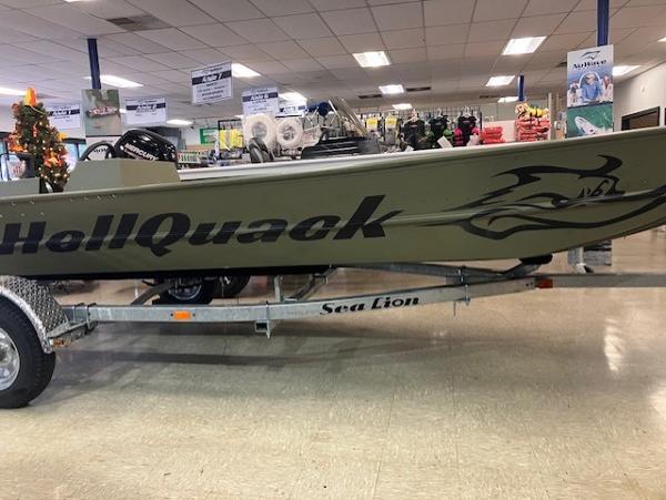 Lund 1852MT 2024 Lund 1852MT boat on Sea Lion trailer in showroom.