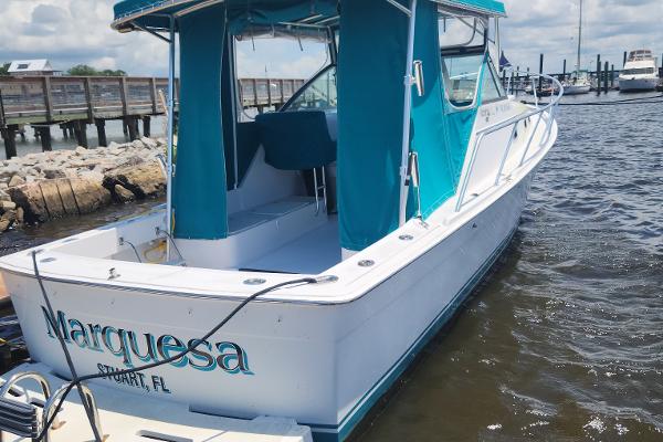 Mainship Pilot 30 1999 Mainship Pilot 30 boat docked, named Marquesa, in Stuart, FL.