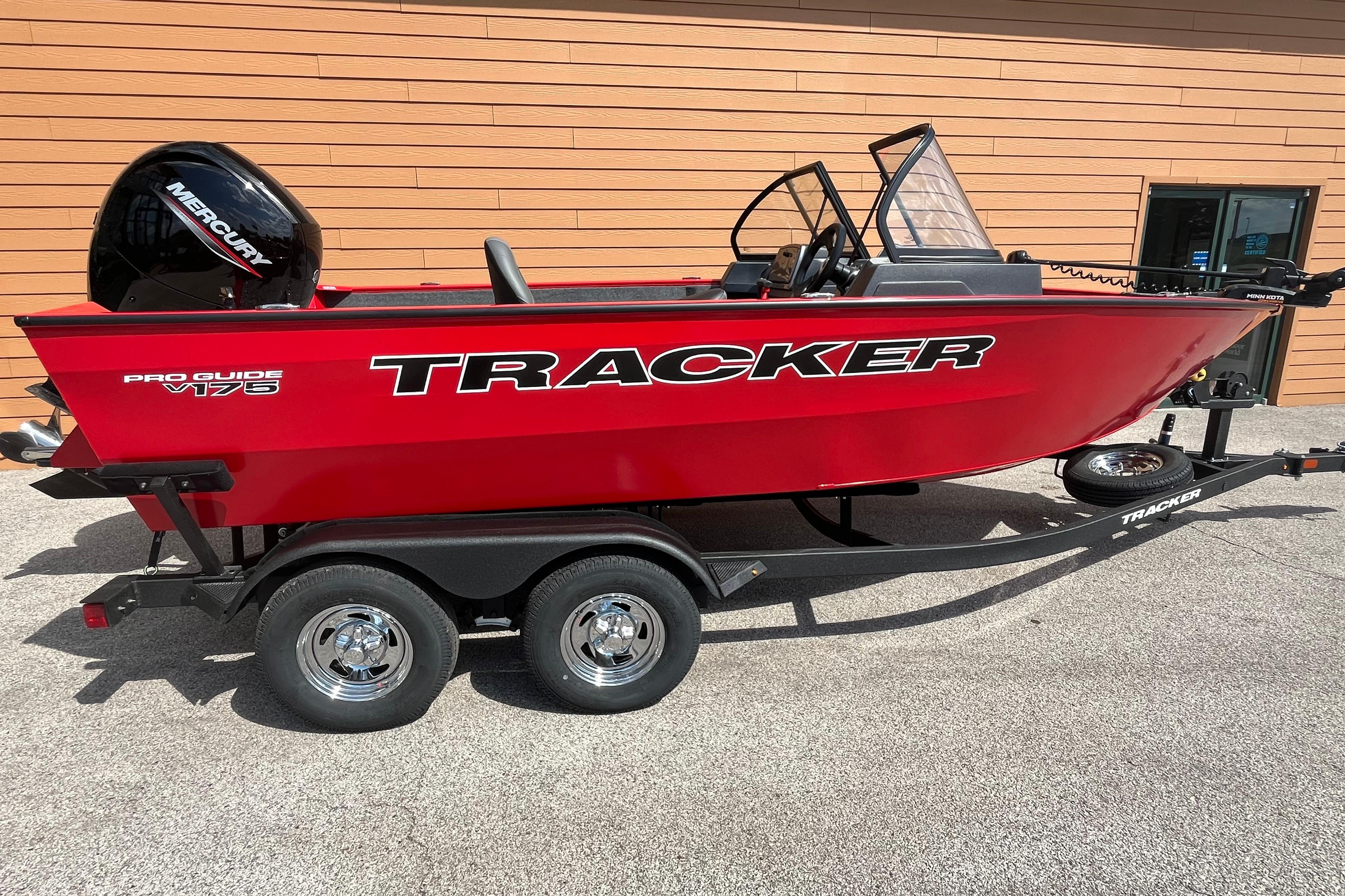 Tracker Pro Guide V-175 Combo 2026 Tracker Pro Guide V-175 Combo boat in vibrant red on a trailer.
