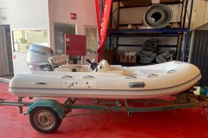 Aermarine Cabrio 360 CH 2016 Aermarine Cabrio 360 CH inflatable boat with Honda motor on trailer.