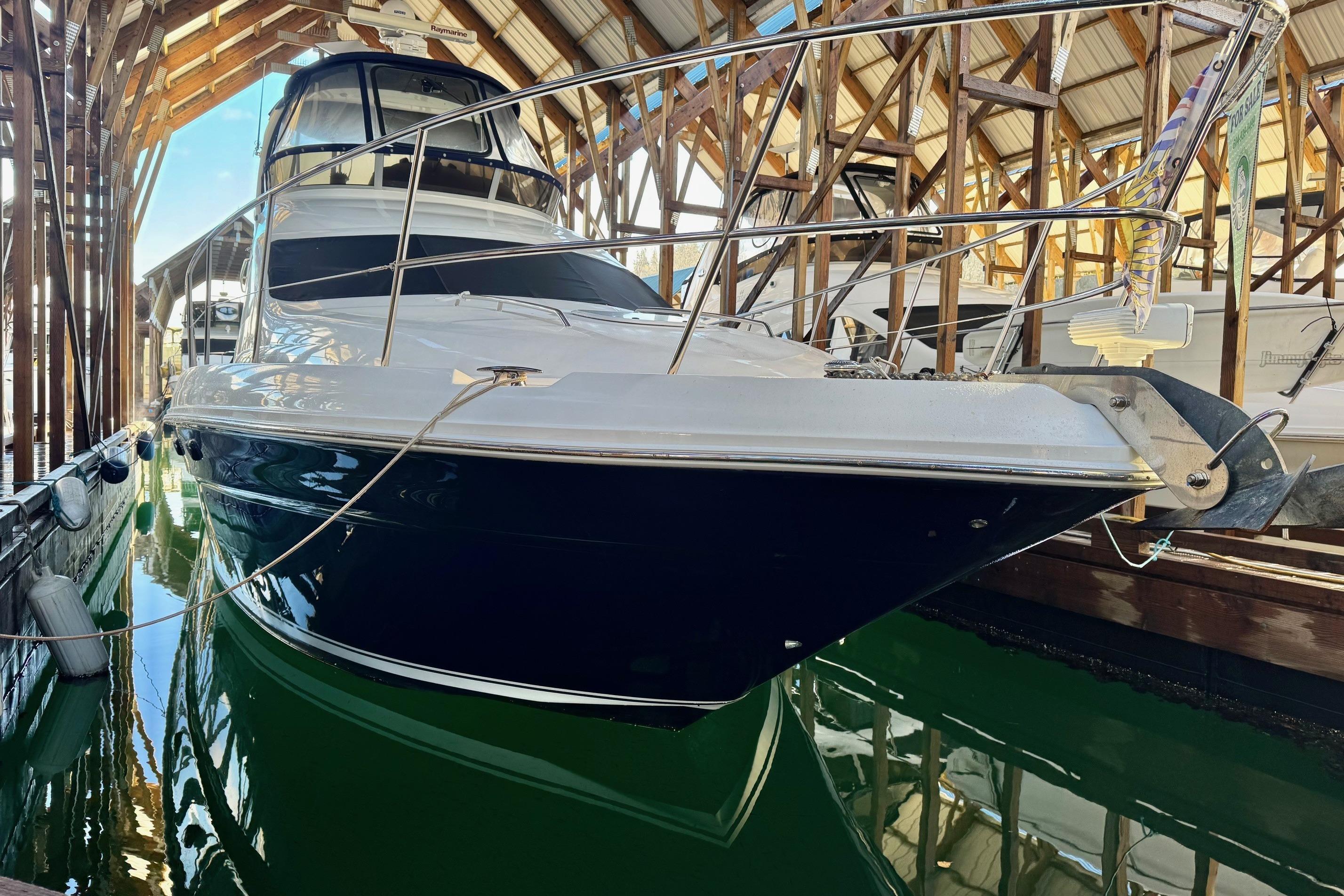 Sea Ray 44 Sedan Bridge 2006 Sea Ray 44 Sedan Bridge yacht docked in a covered marina.