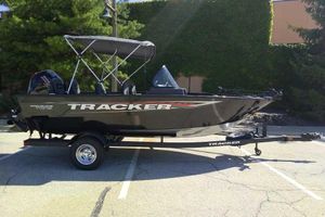 Tracker Pro Guide V-175 Combo 2026 Tracker Pro Guide V-175 Combo boat on trailer, parked outdoors.