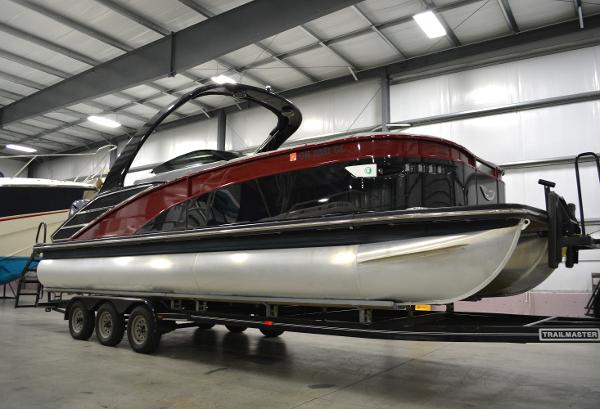 Bennington RX Sport Line 2023 Bennington RX Sport Line boat on trailer in indoor storage facility.
