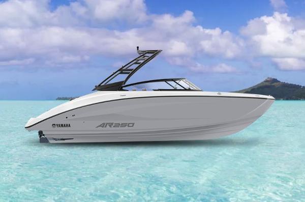 Yamaha Boats AR250 2025 Yamaha AR250 boat on clear turquoise water under a blue sky.