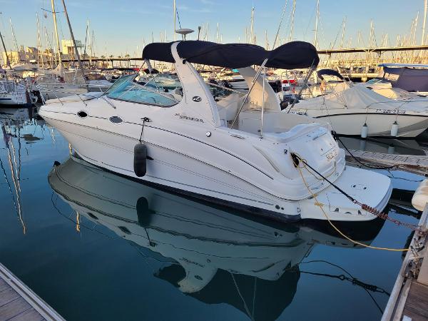 Sea Ray 315 Sundancer 2008 Sea Ray 315 Sundancer yacht docked in marina, calm water reflection.