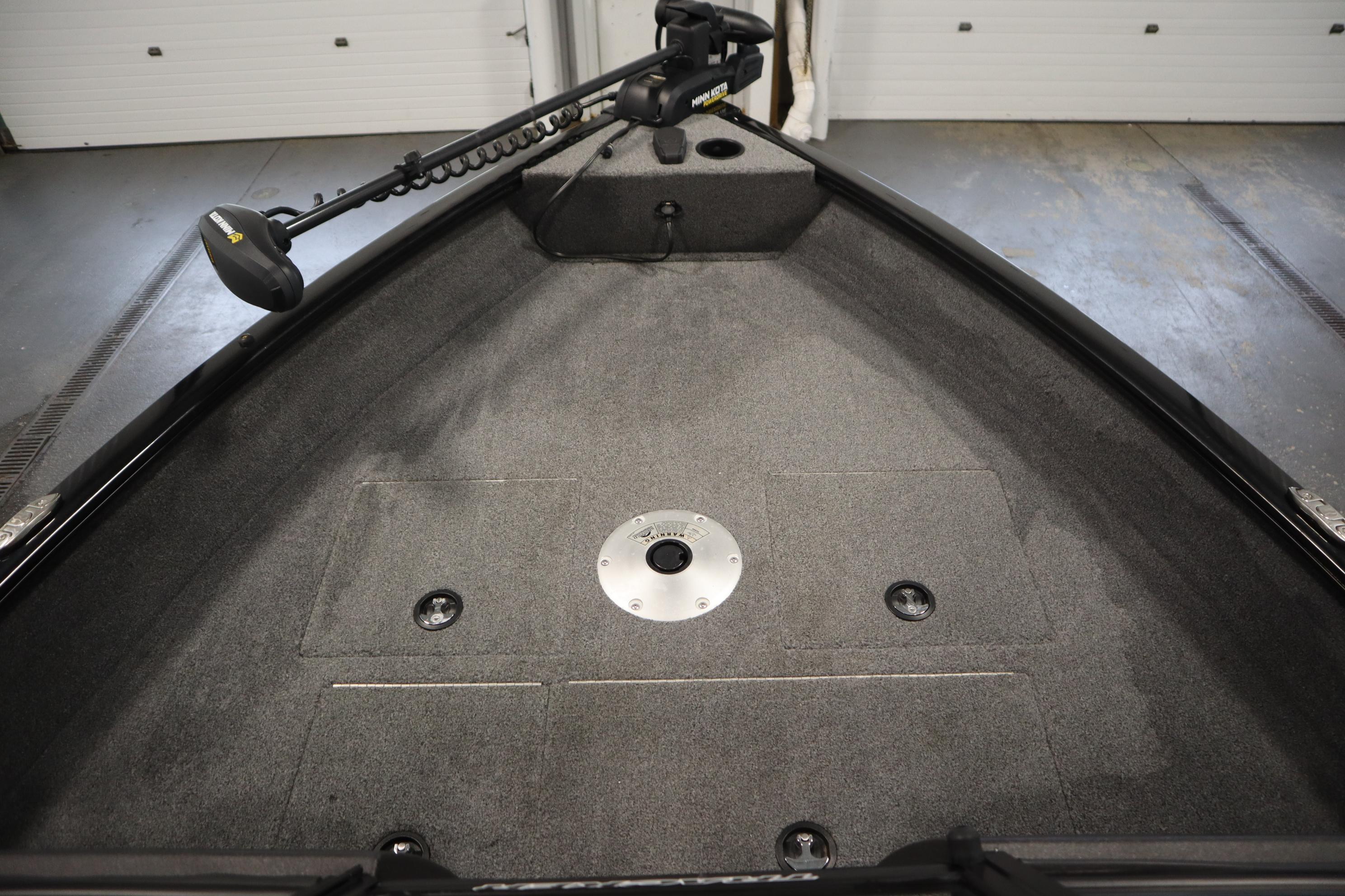 Tracker V16 Pro Guide WT 2023 Tracker V16 Pro Guide WT boat interior with carpeted deck and trolling motor.