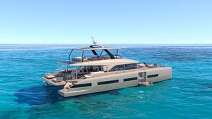 Lagoon EIGHTY 3 Luxurious 2026 Lagoon EIGHTY 3 yacht cruising on clear blue ocean waters.