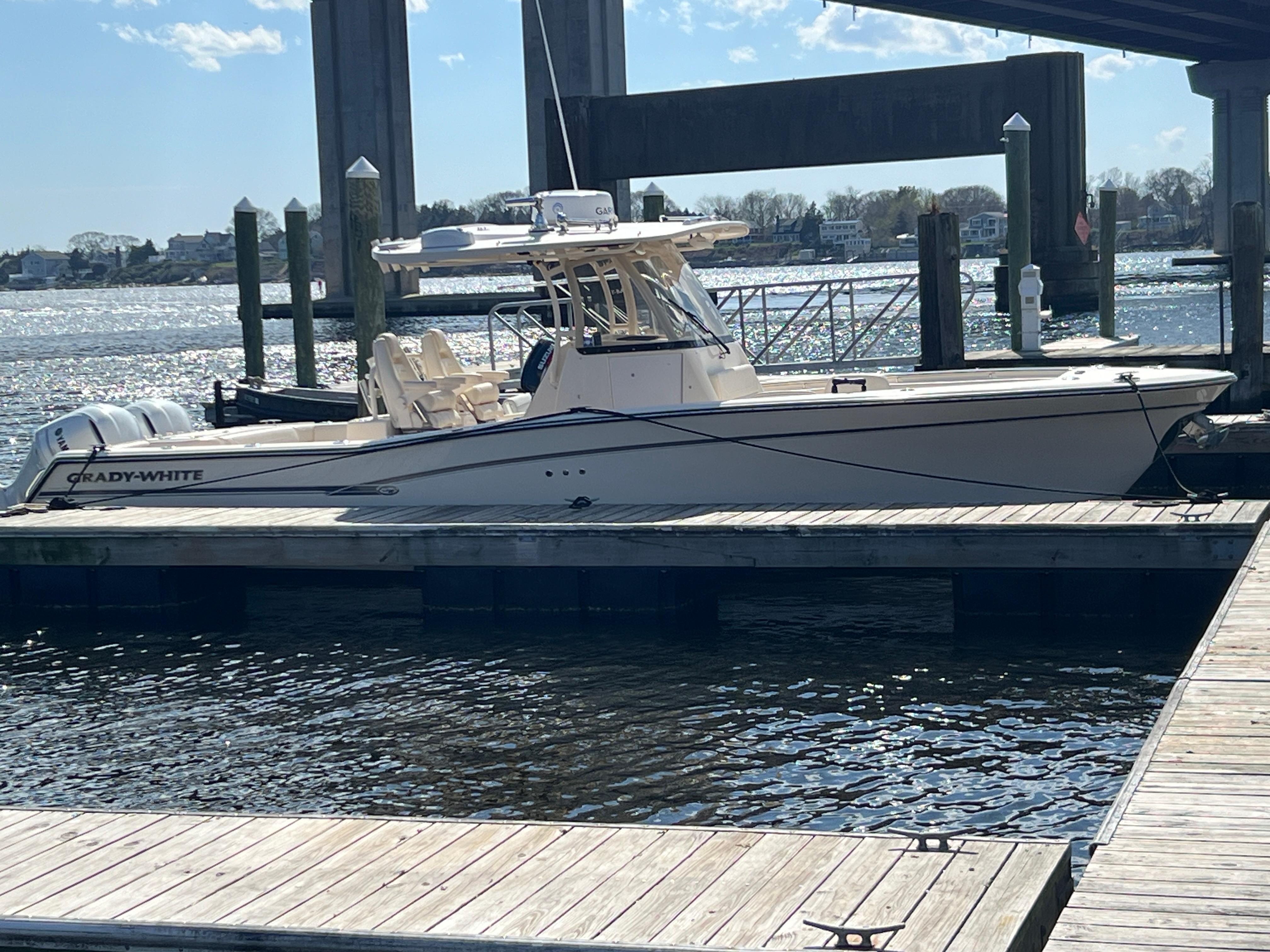 Grady-White Canyon 306 2019 Grady-White Canyon 306 boat docked at marina, sunny day.