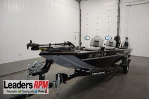 Tracker Panfish 16 2018 Tracker Panfish 16 boat on trailer in indoor showroom.