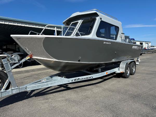 Hewescraft 240 Ocean Pro ET 2024 Hewescraft 240 Ocean Pro ET boat on EZ Loader trailer.