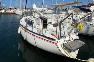 Dufour 2800 1980 Dufour 2800 sailboat docked in a marina, surrounded by other boats.