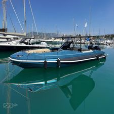 Argo Navis 10GT Blue Argo Navis 10GT boat docked in marina, 2018 model, clear sky background.