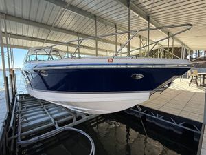 Formula 400 Super Sport 2008 Formula 400 Super Sport boat docked in a covered marina.