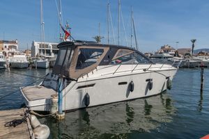 Sealine SC35 2010 Sealine SC35 yacht docked in a marina under clear blue skies.
