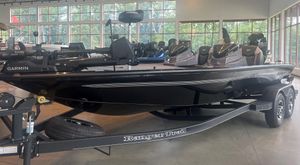 Ranger ALPHA 208 2025 Ranger ALPHA 208 boat on trailer in showroom, featuring Garmin equipment.