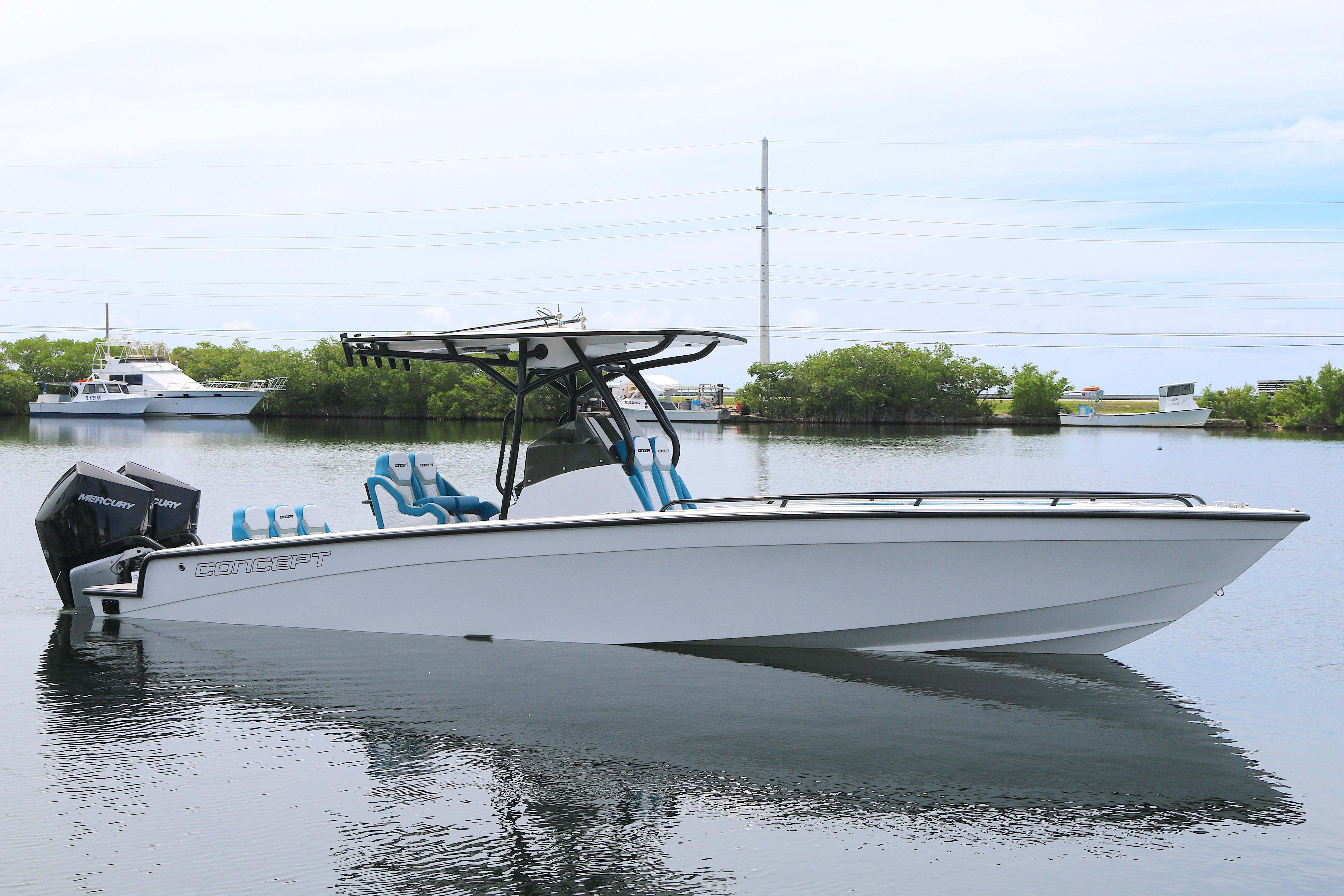 Concept 30 Open Deck 2025 Concept 30 Open Deck boat on calm water, featuring sleek design and modern outboard engines.