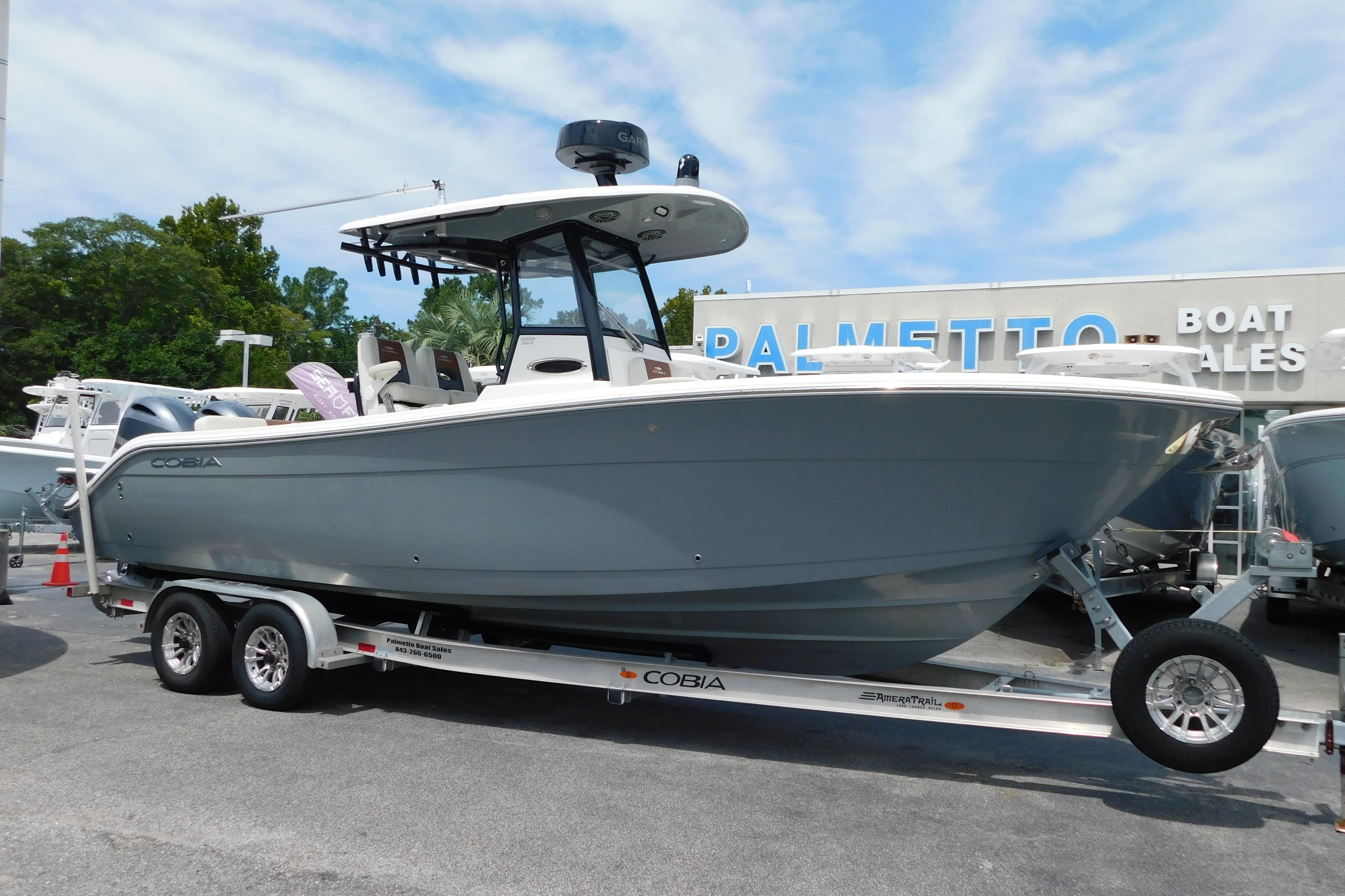 Cobia 262 Center Console 2021 Cobia 262 Center Console boat on trailer at dealership.