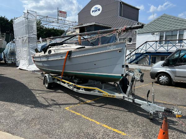 Swallow Yachts Bay Cruiser 23 2023 Swallow Yachts Bay Cruiser 23 on trailer at marina, sunny day.
