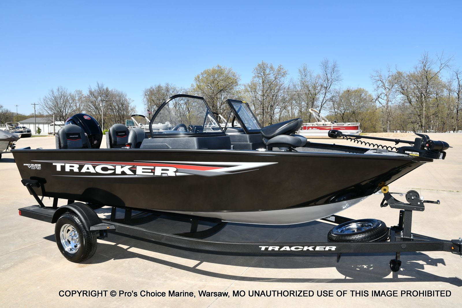 Tracker Pro Guide V-175 Combo 2026 Tracker Pro Guide V-175 Combo boat on trailer, parked outdoors.