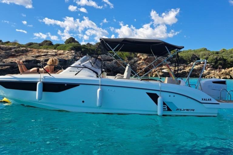 Beneteau Flyer 8 SUNdeck 2021 Beneteau Flyer 8 SUNdeck boat on clear turquoise water, scenic rocky coastline.