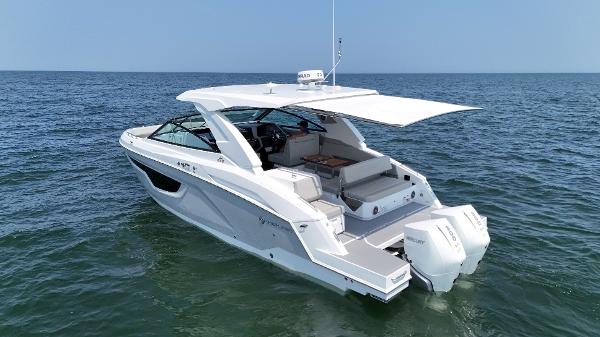 Cruisers Yachts 34 GLS Outboard 2025 Cruisers Yachts 34 GLS Outboard on open water, showcasing sleek design and luxury features.