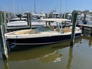 Chris-Craft Calypso 30 2019 Chris-Craft Calypso 30 docked in a marina.