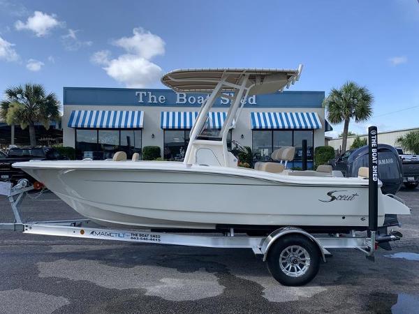 Scout 195 Sportfish 2025 Scout 195 Sportfish boat on trailer outside The Boat Shed.