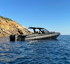 SACS Rebel 47 OB 2021 SACS Rebel 47 OB boat on blue ocean near rocky coastline.
