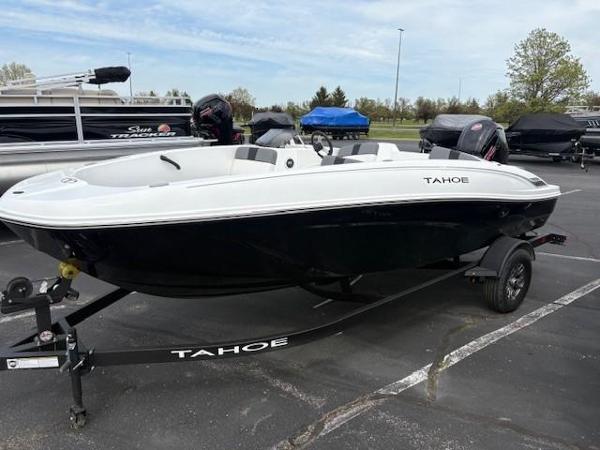 Tahoe T18 2025 Tahoe T18 boat on trailer in parking lot, black and white design.