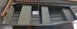 Tracker Grizzly 10 Jon 2025 Tracker Grizzly 10 Jon boat displayed on wooden rack.