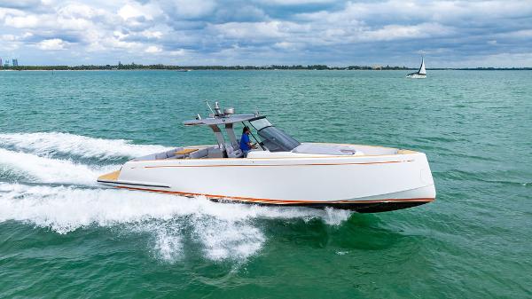 Pardo Yachts 43 2022 Pardo Yachts 43 cruising on open water under a cloudy sky.