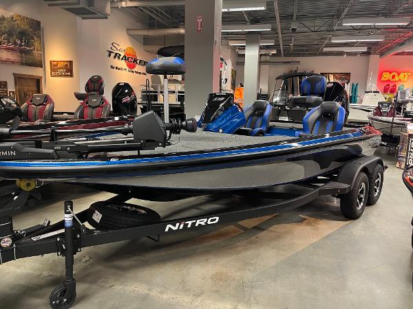 Nitro Z19 2025 Nitro Z19 boat displayed in showroom, featuring sleek design and modern seating.