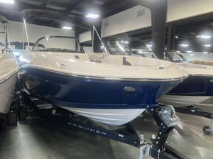 Bayliner VR5 Bowrider I/O 2023 Bayliner VR5 Bowrider I/O on display in a showroom.