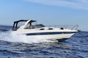 Bavaria 32 Sport 2005 Bavaria 32 Sport yacht cruising on open water under clear skies.