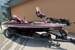 Ranger Z175 2020 Ranger Z175 boat on trailer, maroon color, parked outdoors.