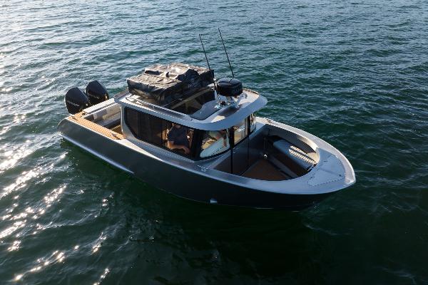 Jasper Marine Defender 22 2025 Jasper Marine Defender 22 boat on open water, featuring sleek design and dual engines.