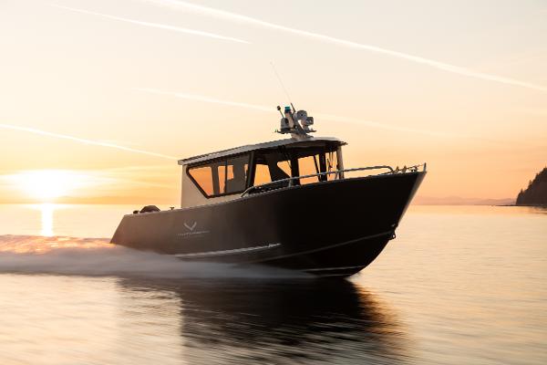 Jasper Marine Defender 22 2025 Jasper Marine Defender 22 boat cruising at sunset.
