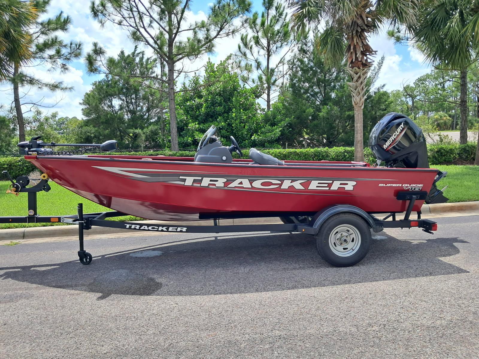 Tracker Super Guide V-16 T 2025 Tracker Super Guide V-16 T boat on trailer, parked outdoors.