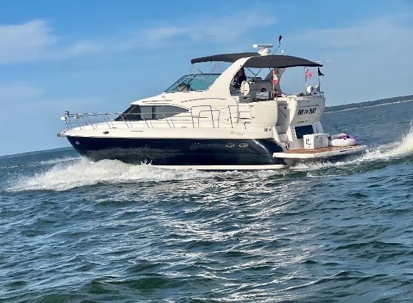 Cruisers Yachts 4450 Express Motoryacht 2001 Cruisers Yachts 4450 Express Motoryacht cruising on open water.