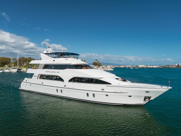 President Sterling Tri-Deck Luxury 2011 President Sterling Tri-Deck yacht cruising on a sunny day.