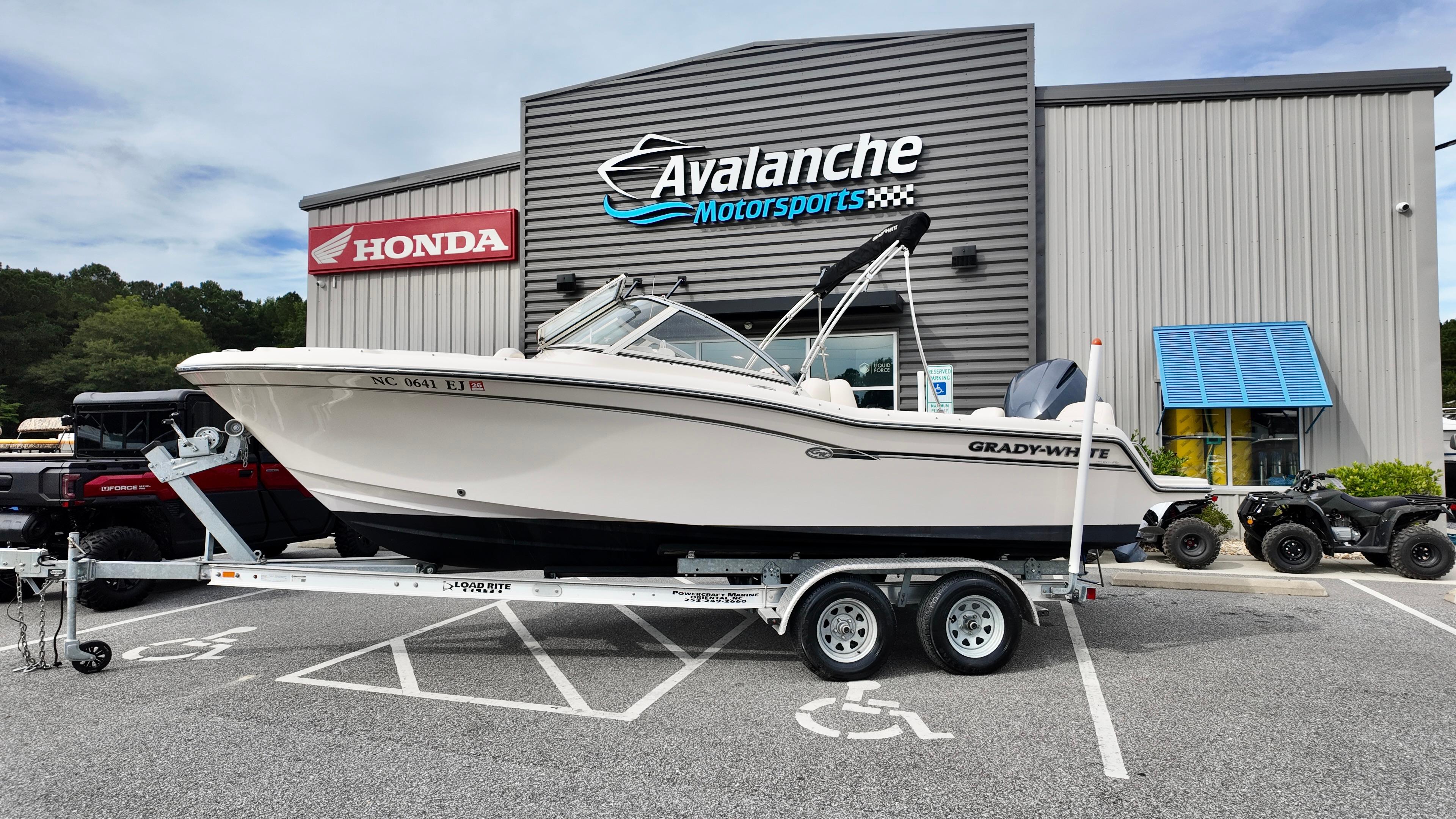 Grady-White Freedom 215 2018 Grady-White Freedom 215 boat on trailer at Avalanche Motorsports dealership.