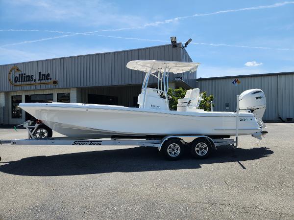 BlackJack 256 Coastal 2025 BlackJack 256 Coastal boat on trailer outside dealership.