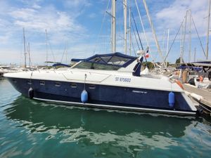Ferretti Yachts Altura 47 1989 Ferretti Yachts Altura 47 docked in marina, blue and white exterior.