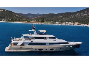 Custom Line Navetta 33 Luxury yacht Custom Line Navetta 33, 2011 model, cruising in scenic coastal waters.