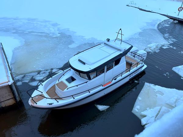 Sargo 28 All Season 2025 Sargo All Season boat navigating icy waters, showcasing durability and design.